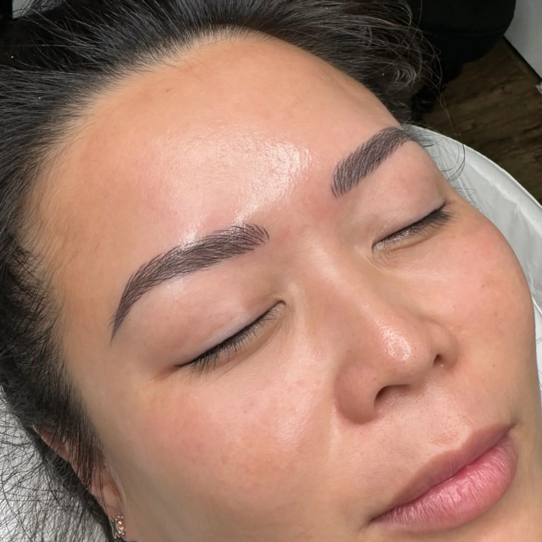 eyebrow feathering technique close-up