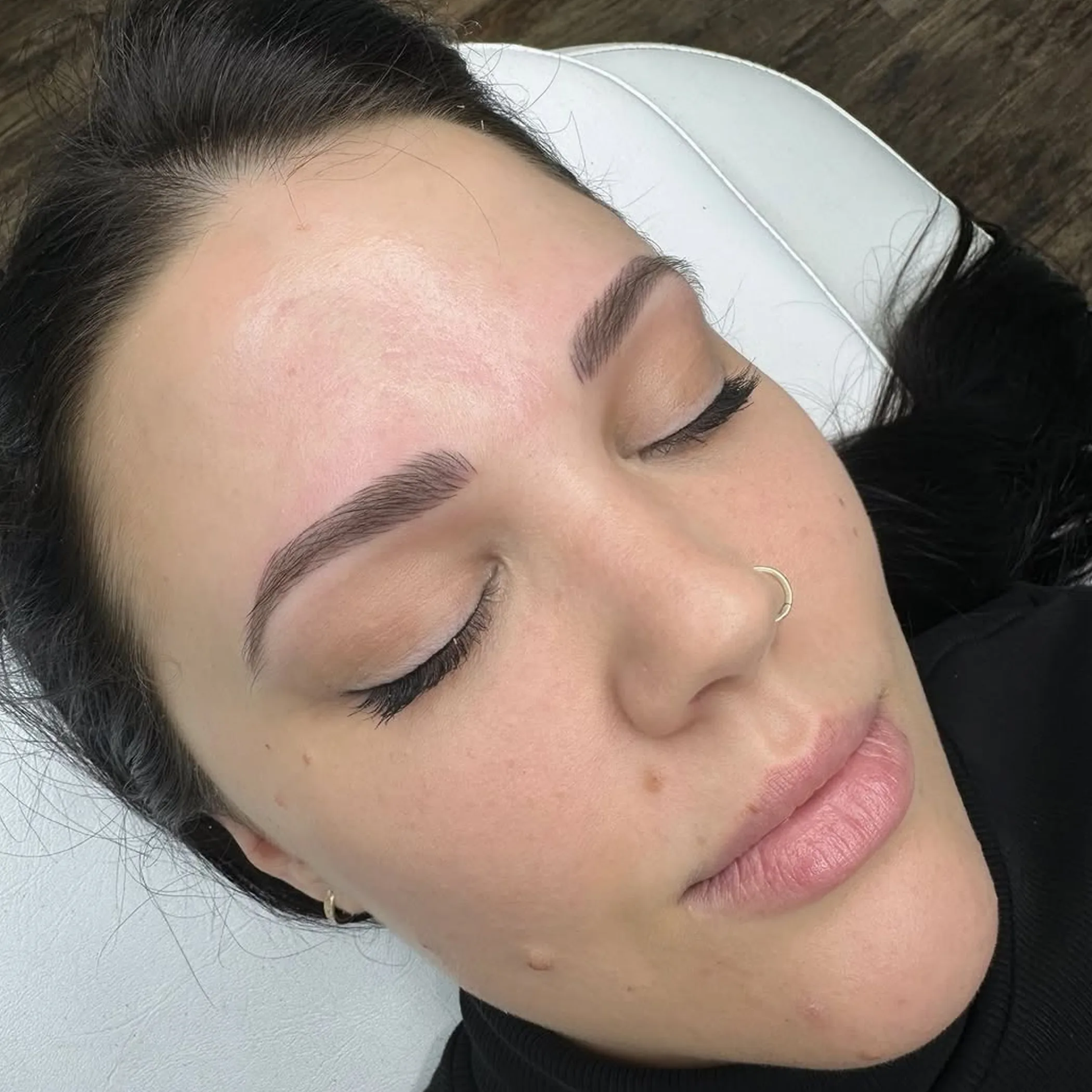 close-up of feathered eyebrow detail